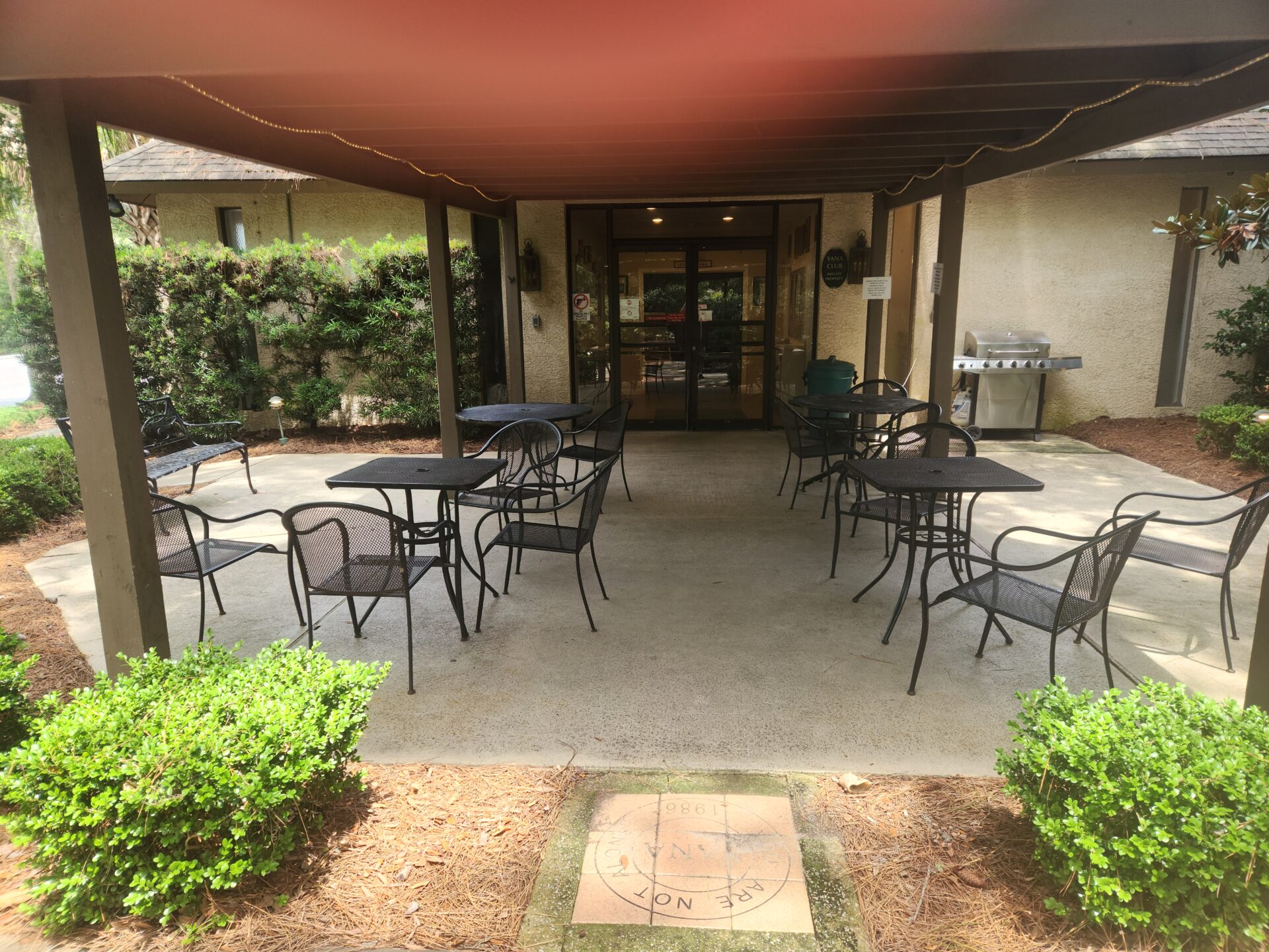 Outdoor patio with tables and chairs